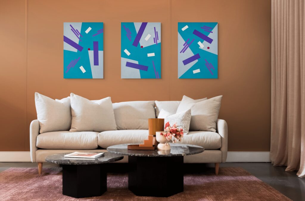 Abstract, textured paintings by Adra - Balance Triptych in orange wall living room 01